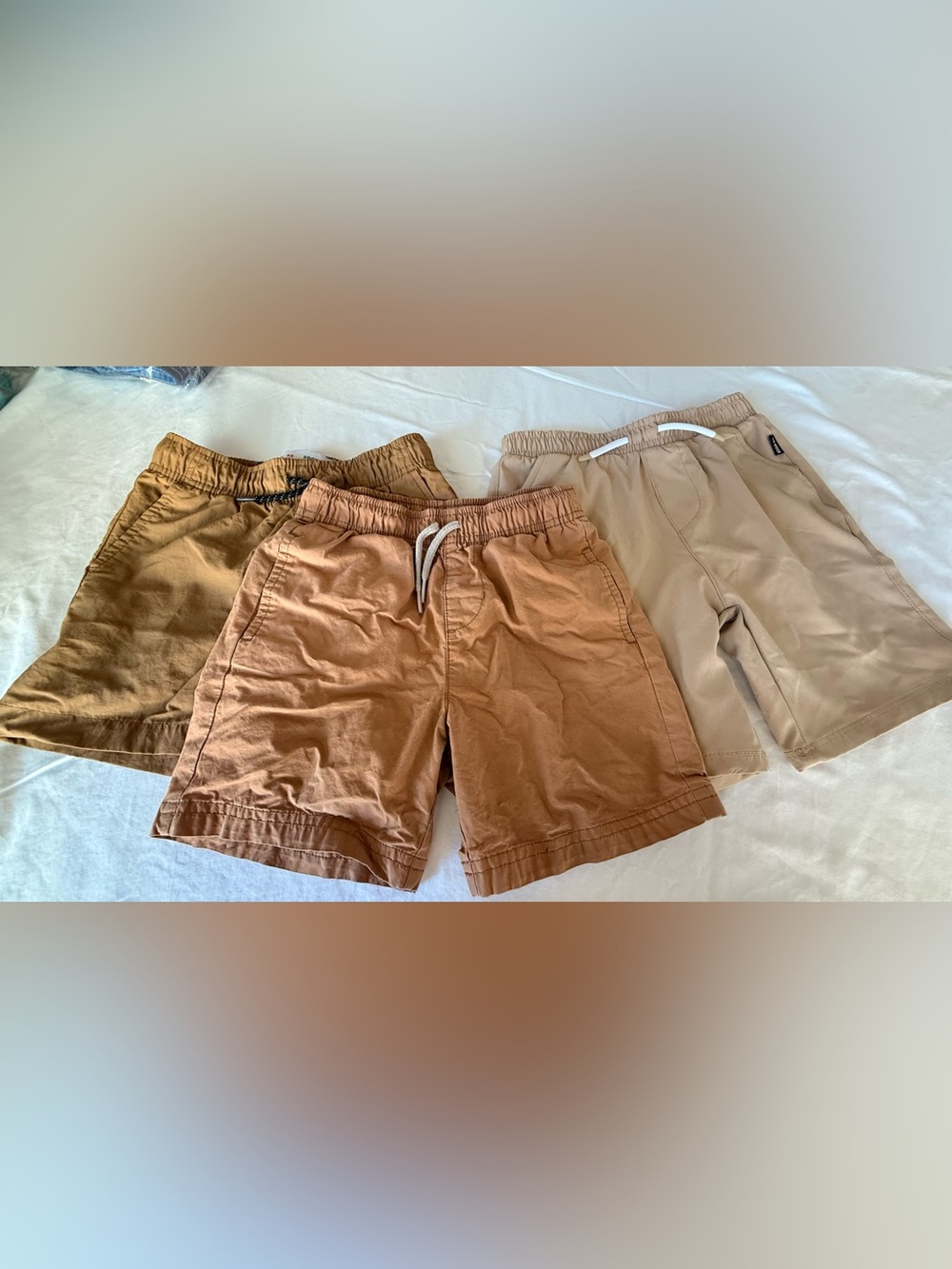 3 pairs pull on shorts. Old navy x2, Eddie Bauer,